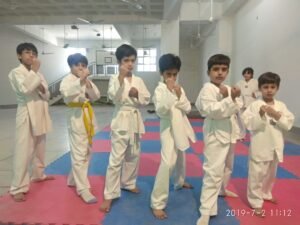 GROUP PHOT DURING TAEKWONDO PRACTICE SESSION