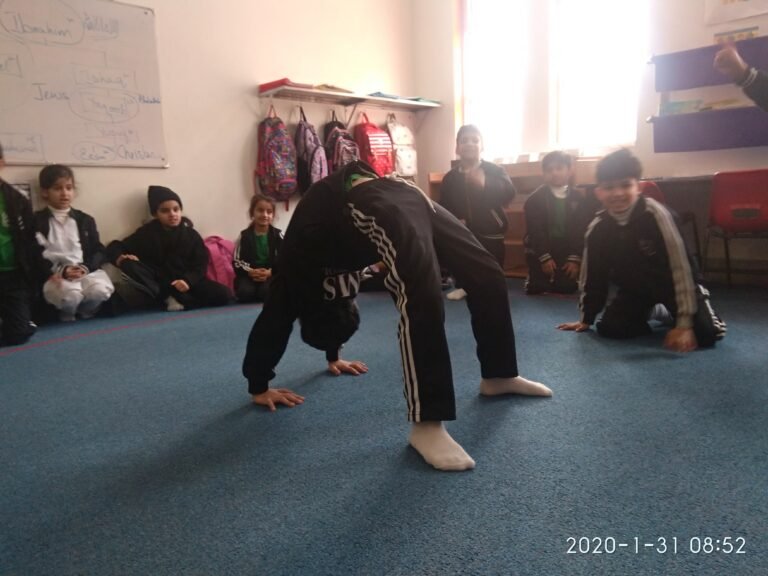 Class 2 showcasing their Gymnastics skills